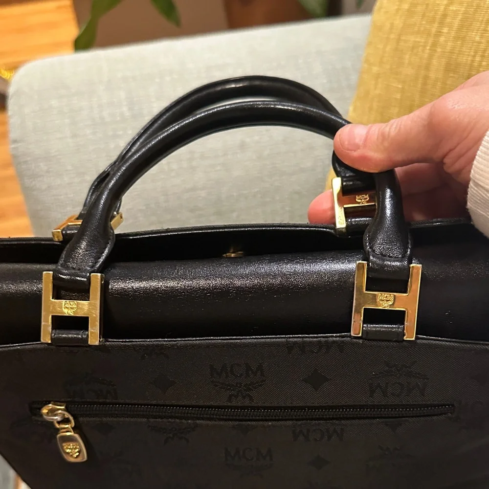 MCM Black Leather hand bag with Gold Accents. Made in Germany